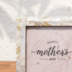 Close-up of the white Mother of Pearl photo frame inlay