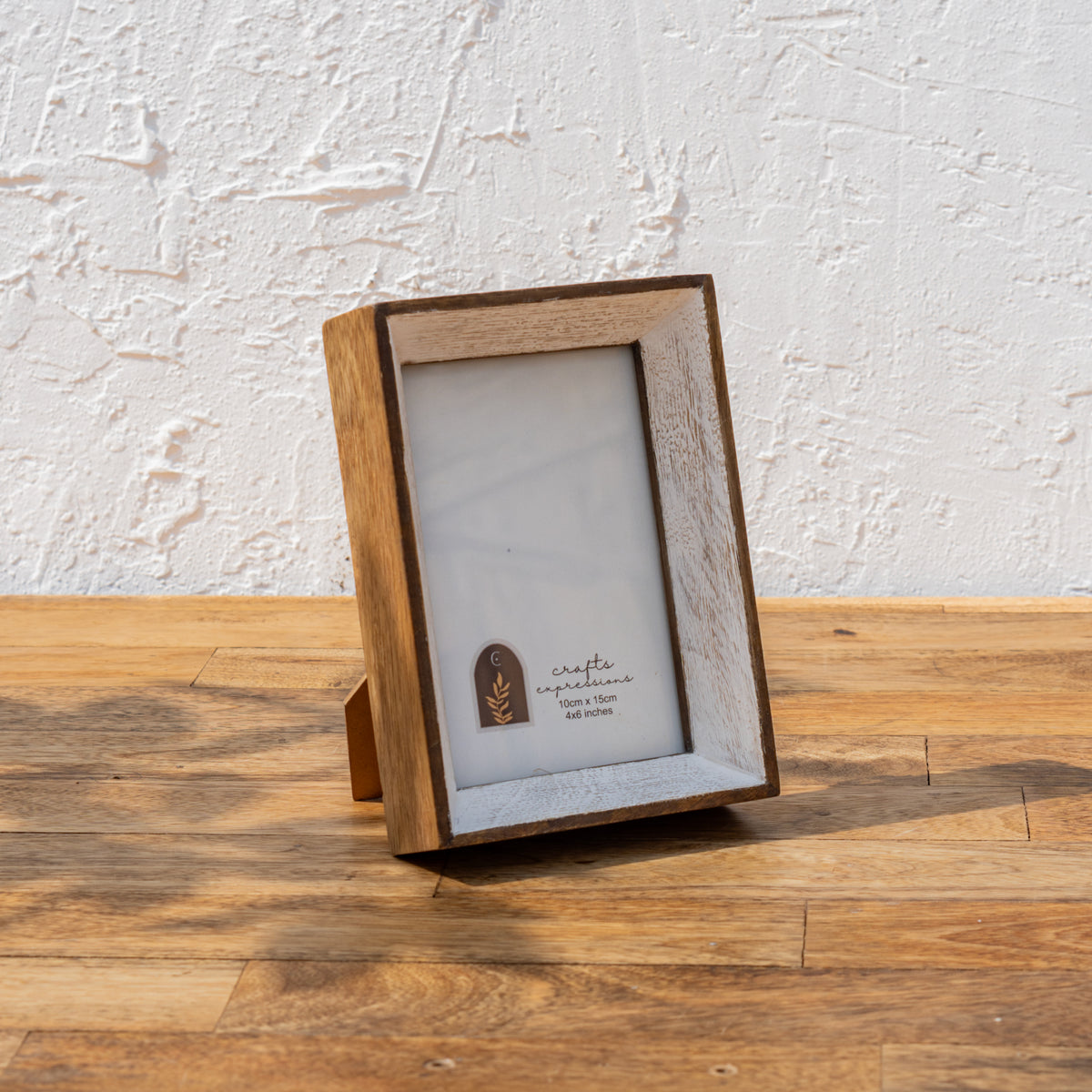 Niche small wooden photo frame for a 4 × 6 inch print