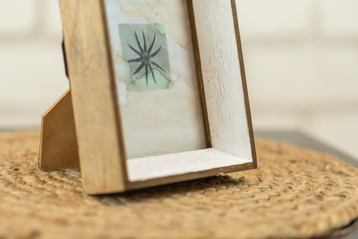 Close-up angled view of the Niche small wooden photo frame