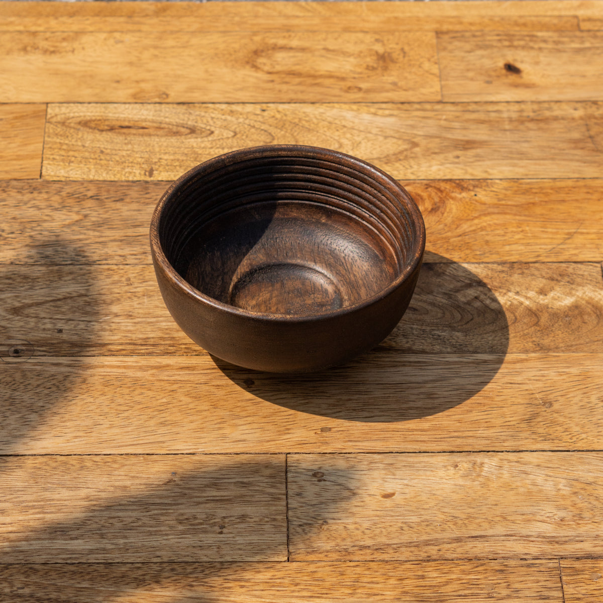 Side view of the Orbit wooden nut bowl