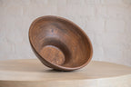 Oro wooden serving bowl displayed at an angle