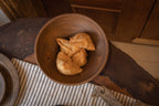 Oro wooden serving bowl styled with snacks