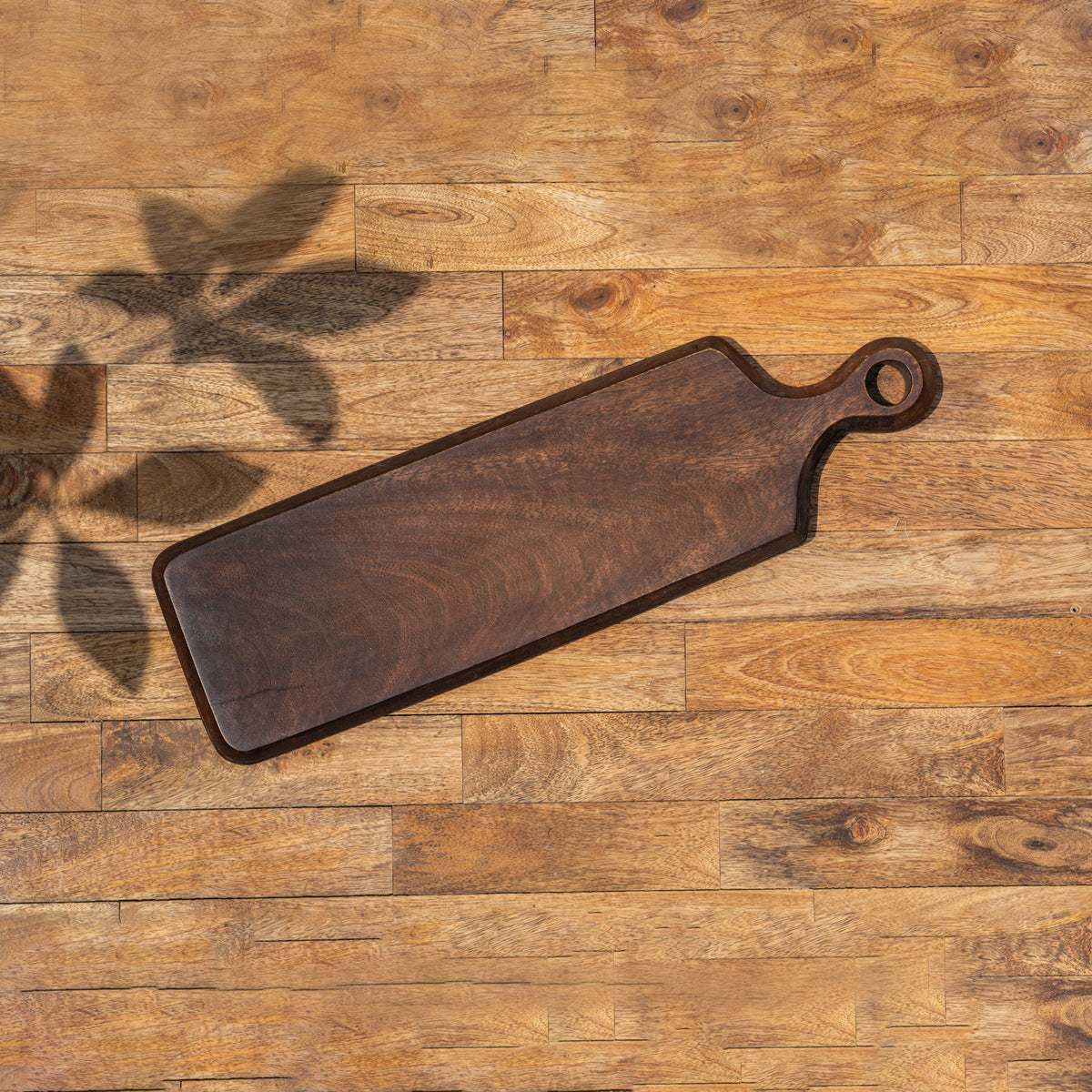 Top view of the Paddle wooden cheese board