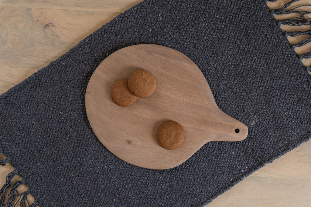 Top view of the Pebble Ash wooden platter with bread rolls
