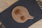 Top view of the Pebble Ash wooden platter with bread rolls