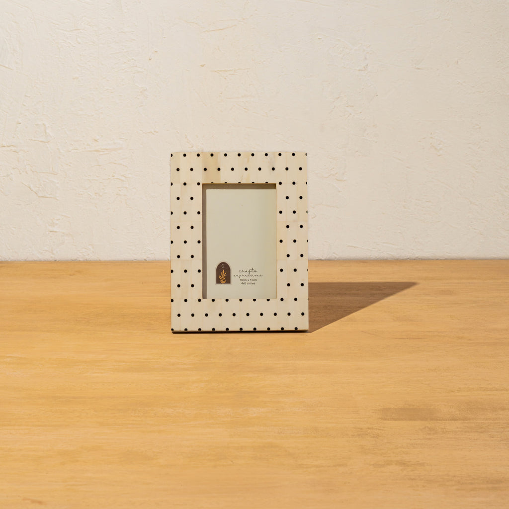Front view of the Polka Dot photo frame displayed vertically
