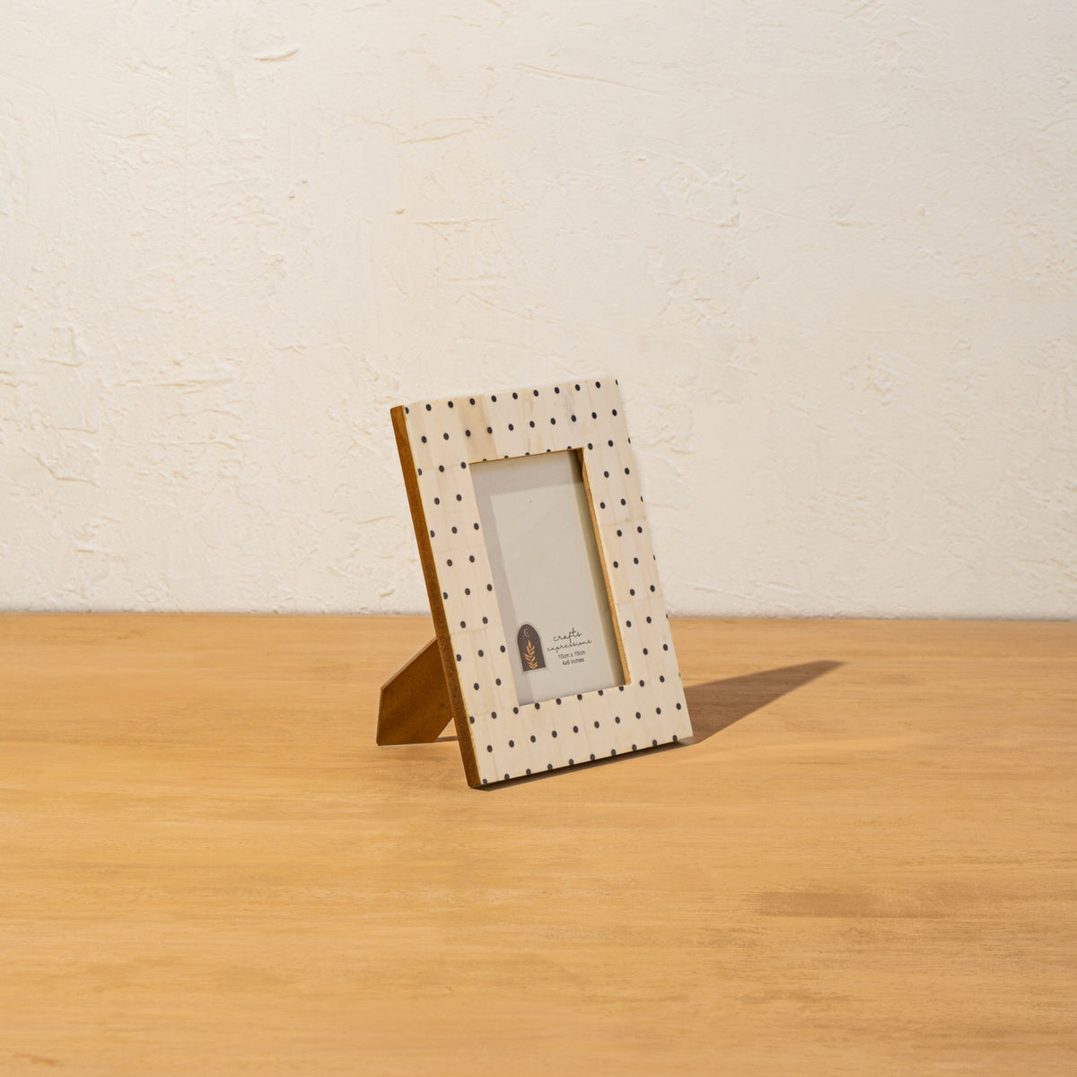 Angled view of the Polka Dot photo frame