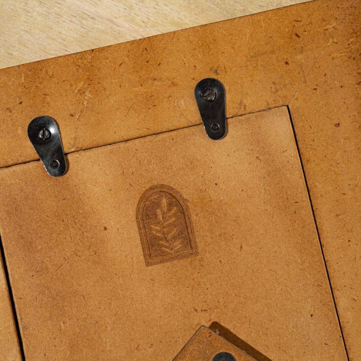 Close-up of the wall-hanging fittings on the Polka Dot photo frame