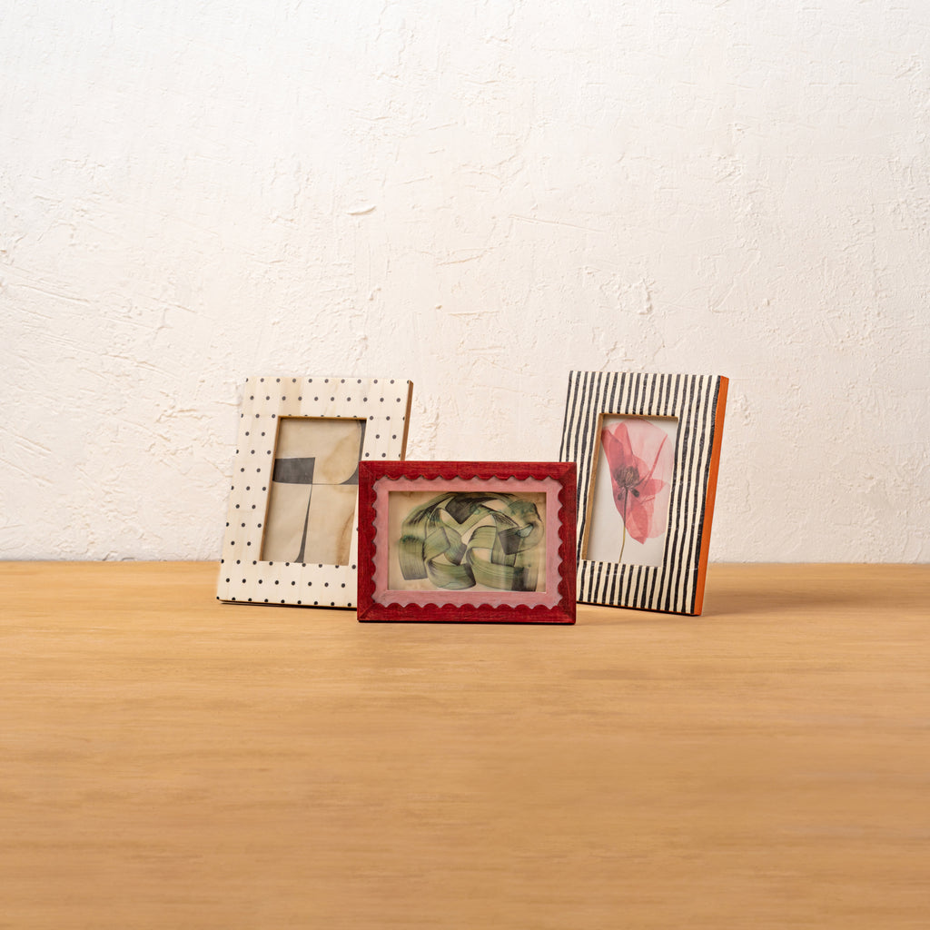 Polka Dot photo frame displayed with three other frames