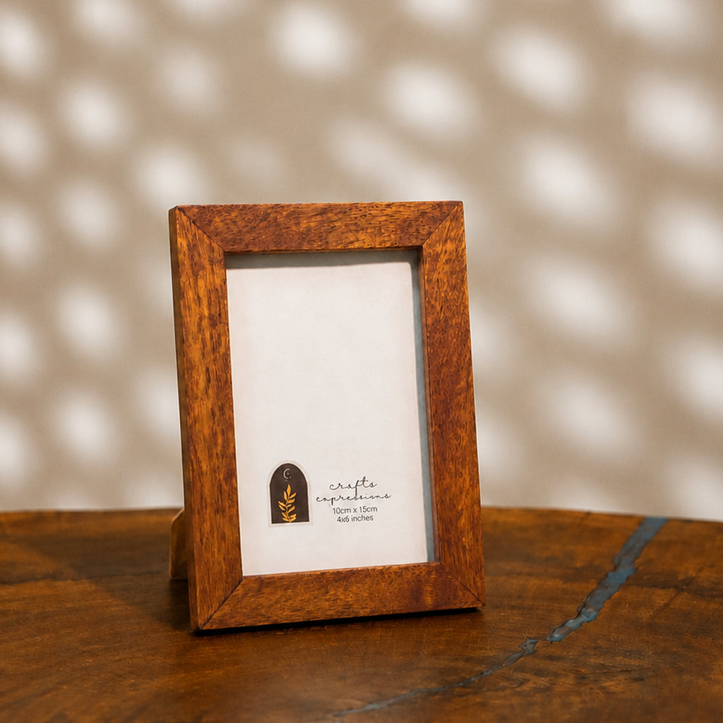Textured earthy-brown wooden photo frame for a 4 by 6 inch photograph