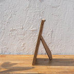 Side view of the Stripes wooden photo frame with easel stand