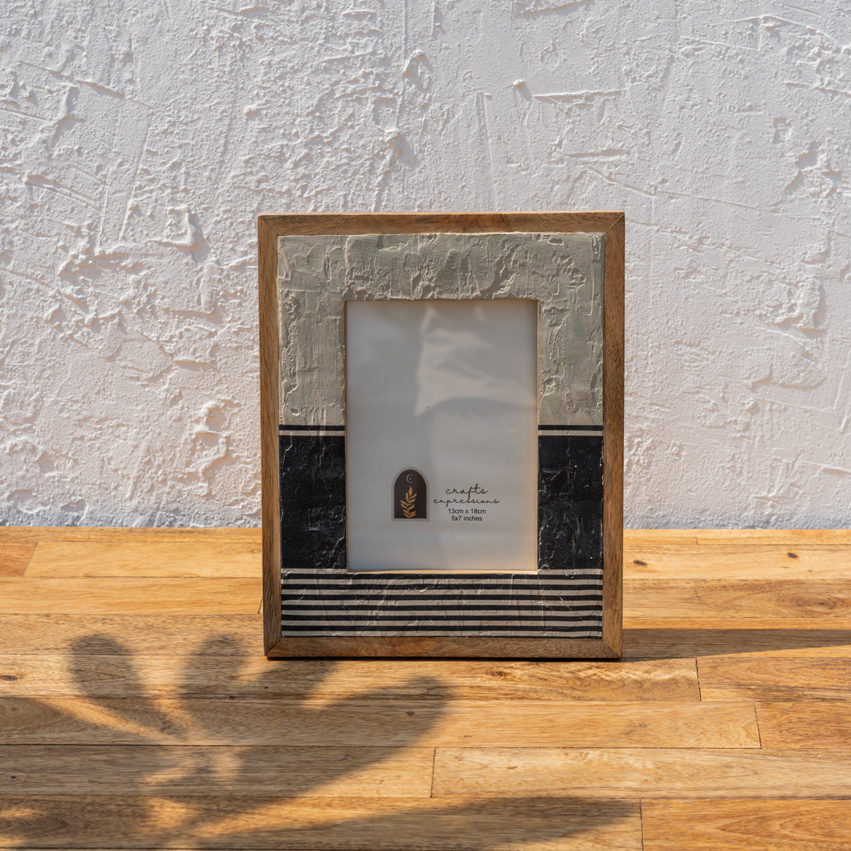 Front view of the Stripes wooden photo frame displayed vertically