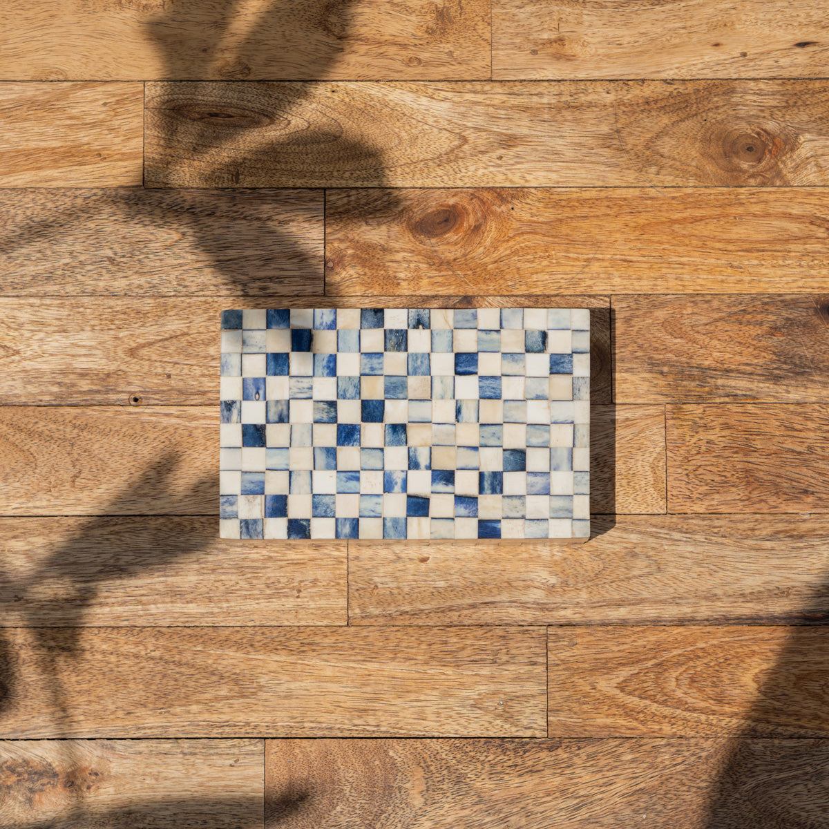 Top view of the patterned lid of the Checker wooden storage box