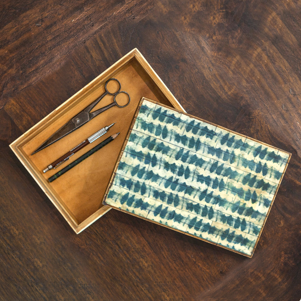 Open Coastal storage box styled with small utensils