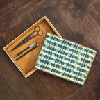 Open Coastal storage box styled with small utensils