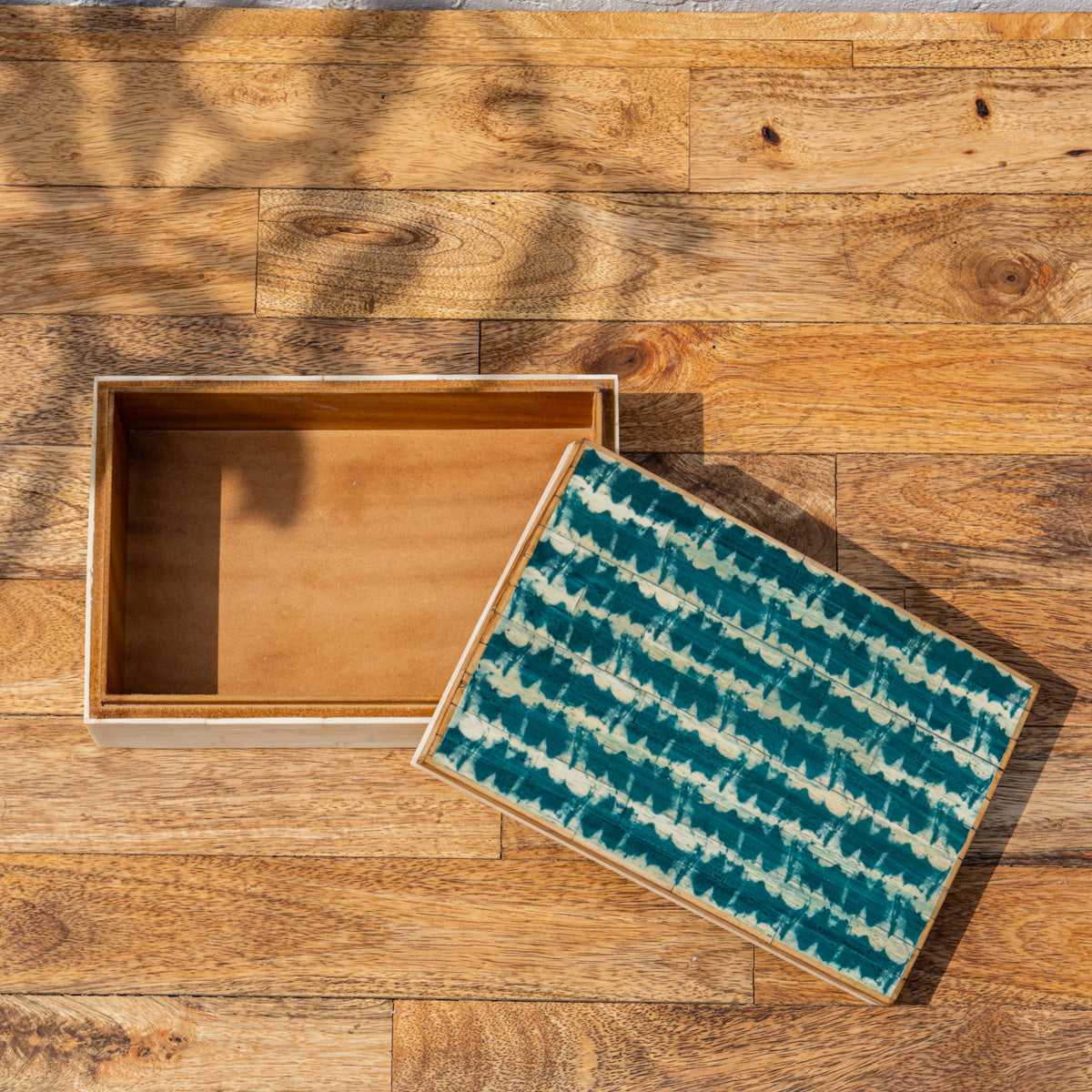 Top view of the open Coastal storage box and lid