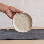 Drift trinket tray held in one hand