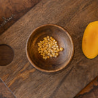 Ellipse wooden nut bowl styled with small snacks