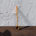 Glide wooden spoon standing upright
