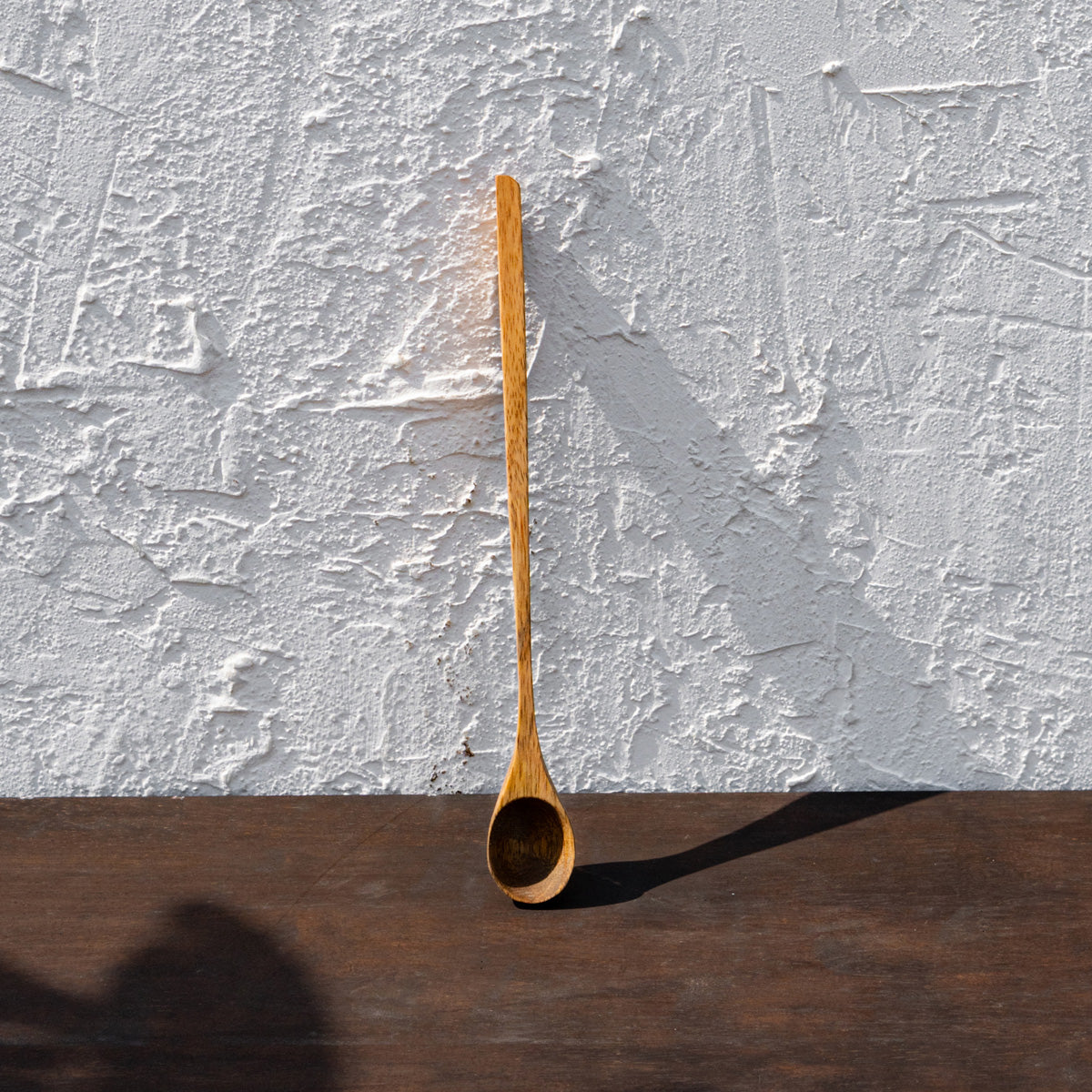 Glide wooden spoon standing upright