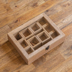 Open Khazana wooden masala box showing nine spice compartments