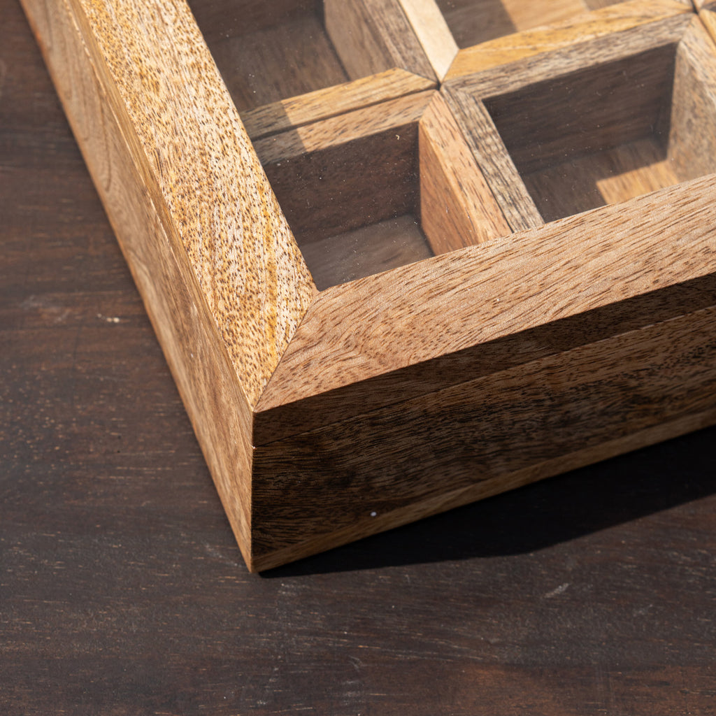 Close-up of the Khazana masala box's natural wood compartments and joinery