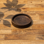 Angled top view of the Orbit wooden platter