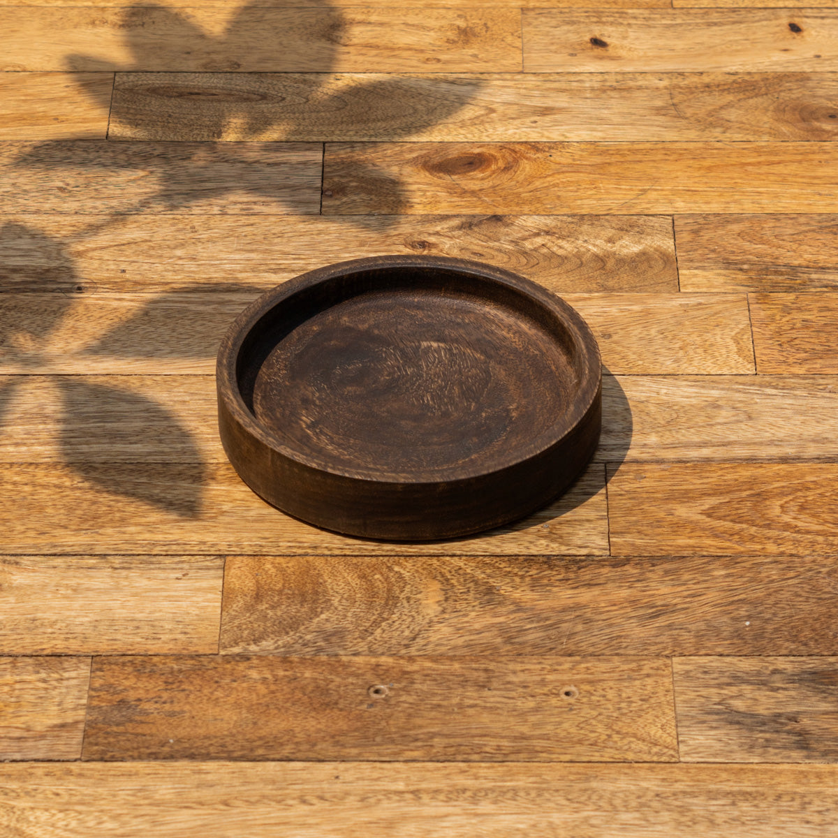 Angled top view of the Orbit wooden platter