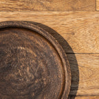 Close-up of the rim of the Orbit wooden platter