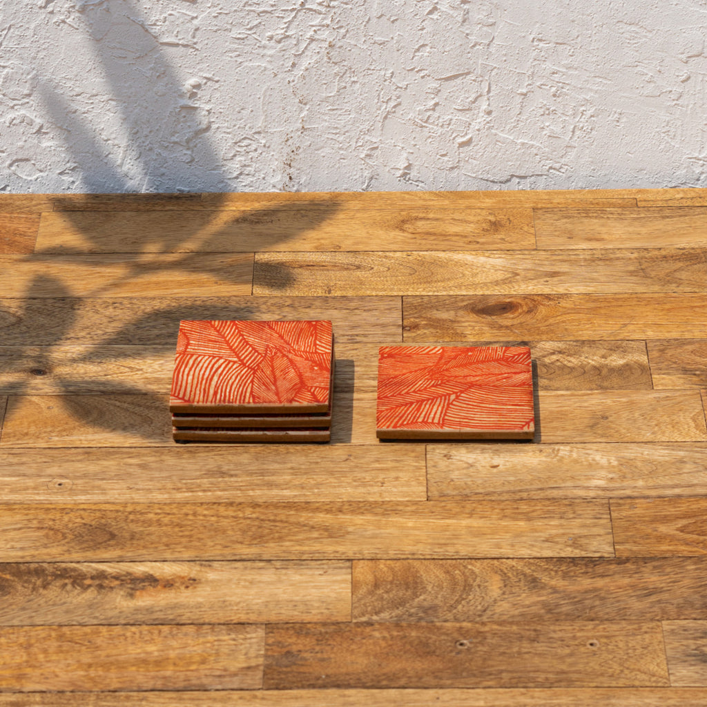 Palash printed coasters arranged in two stacks