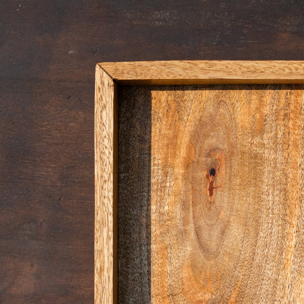 Close-up of the corner of the Trunk wooden tray