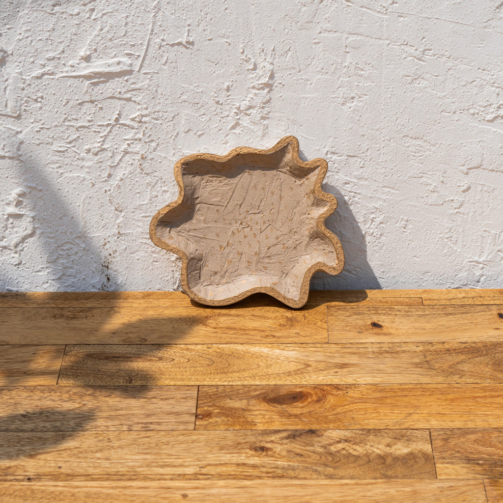 Twister trinket tray standing upright