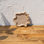 Twister trinket tray standing upright