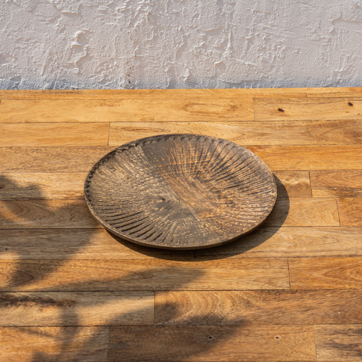 Angled view of the small Terrain wooden platter