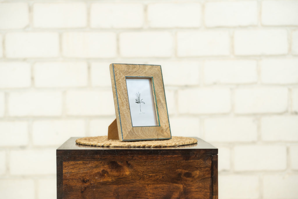 Small Trunk photo frame styled on a wooden block