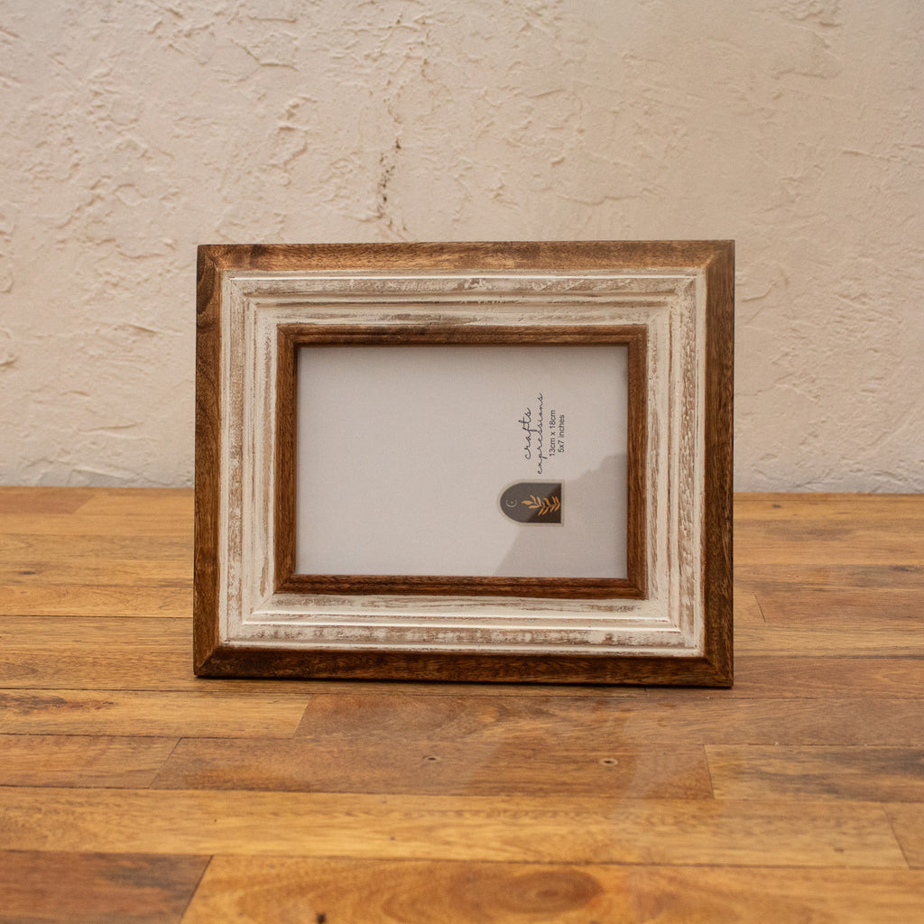 White wooden photo frame displayed horizontally