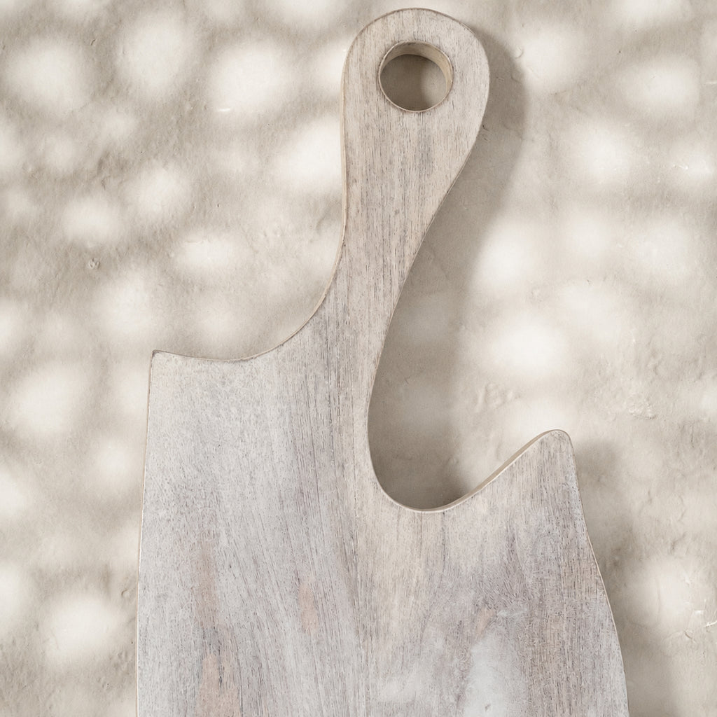 Close-up of the plain whitewashed Freeform wooden serving board