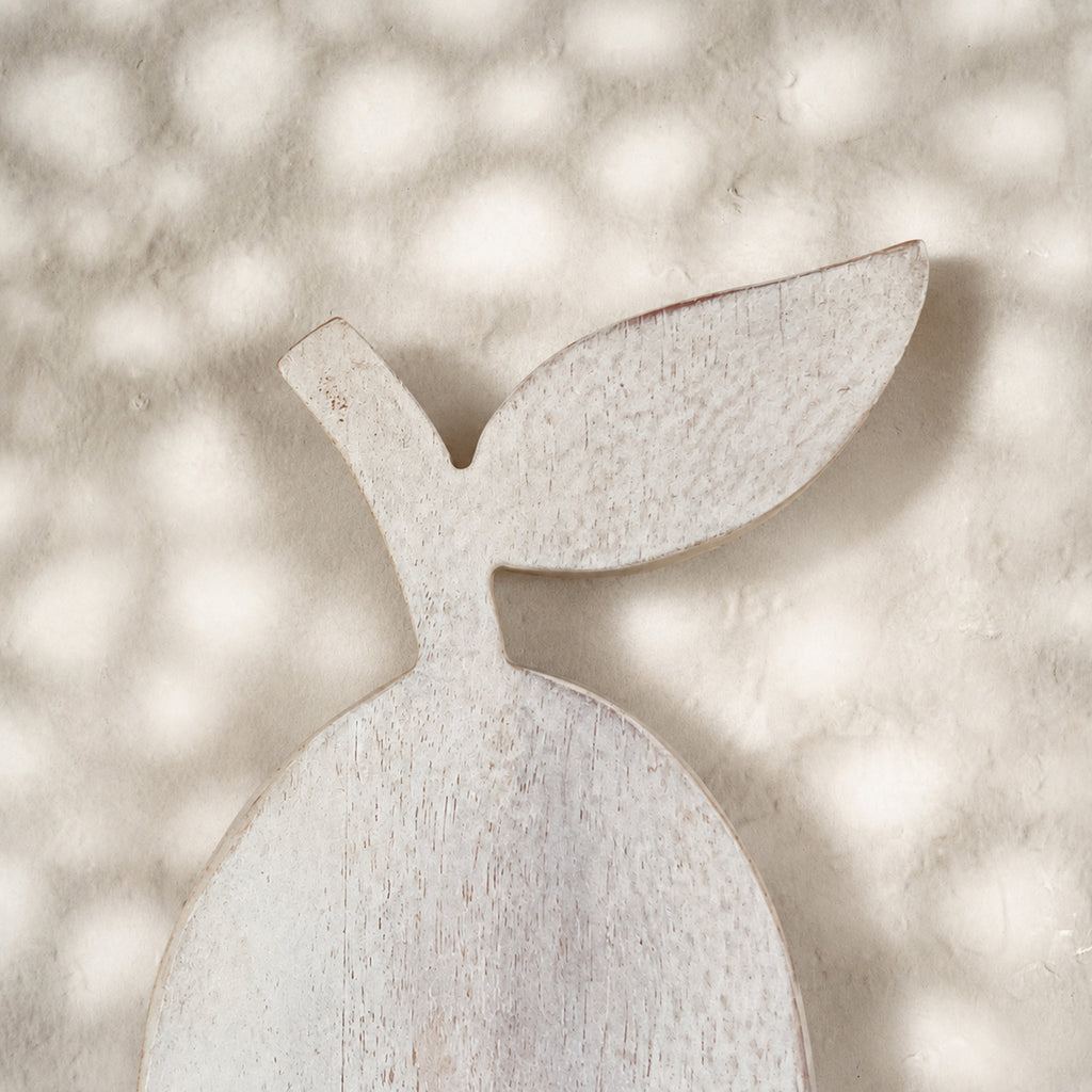 Close-up of the leaf detail on the whitewashed Orchard pear-shaped trivet