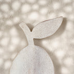 Close-up of the leaf detail on the whitewashed Orchard pear-shaped trivet