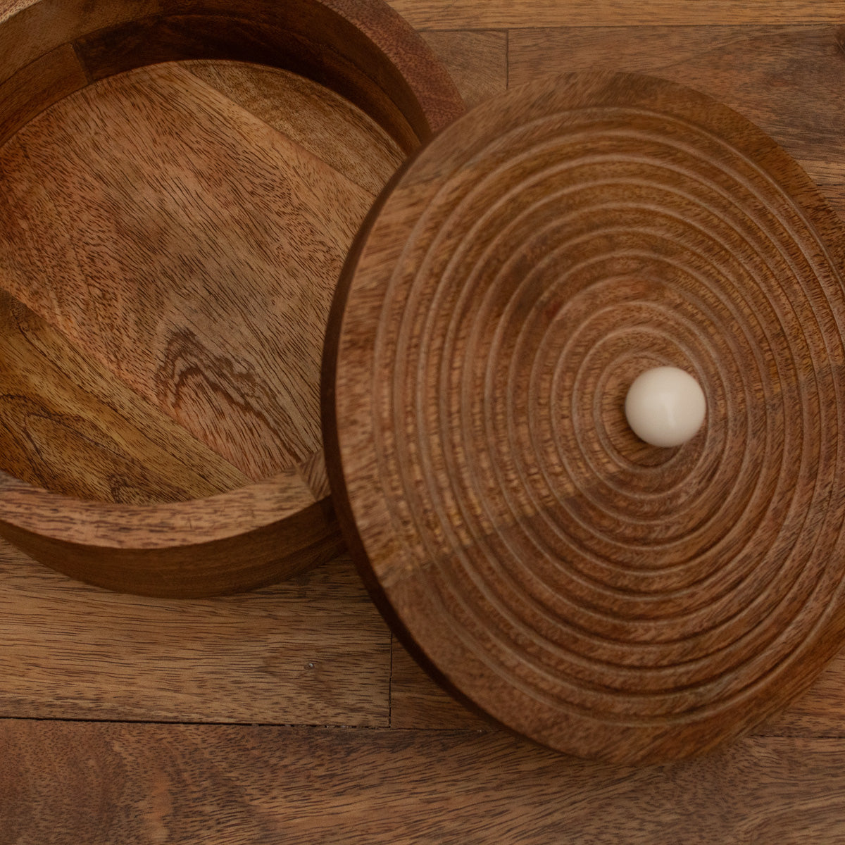 Close-up of the carved interior of the wooden roti box lid
