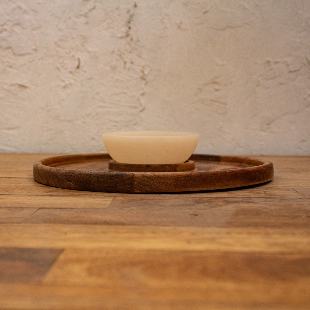 Side view of the wooden chip and dip platter with its bowl