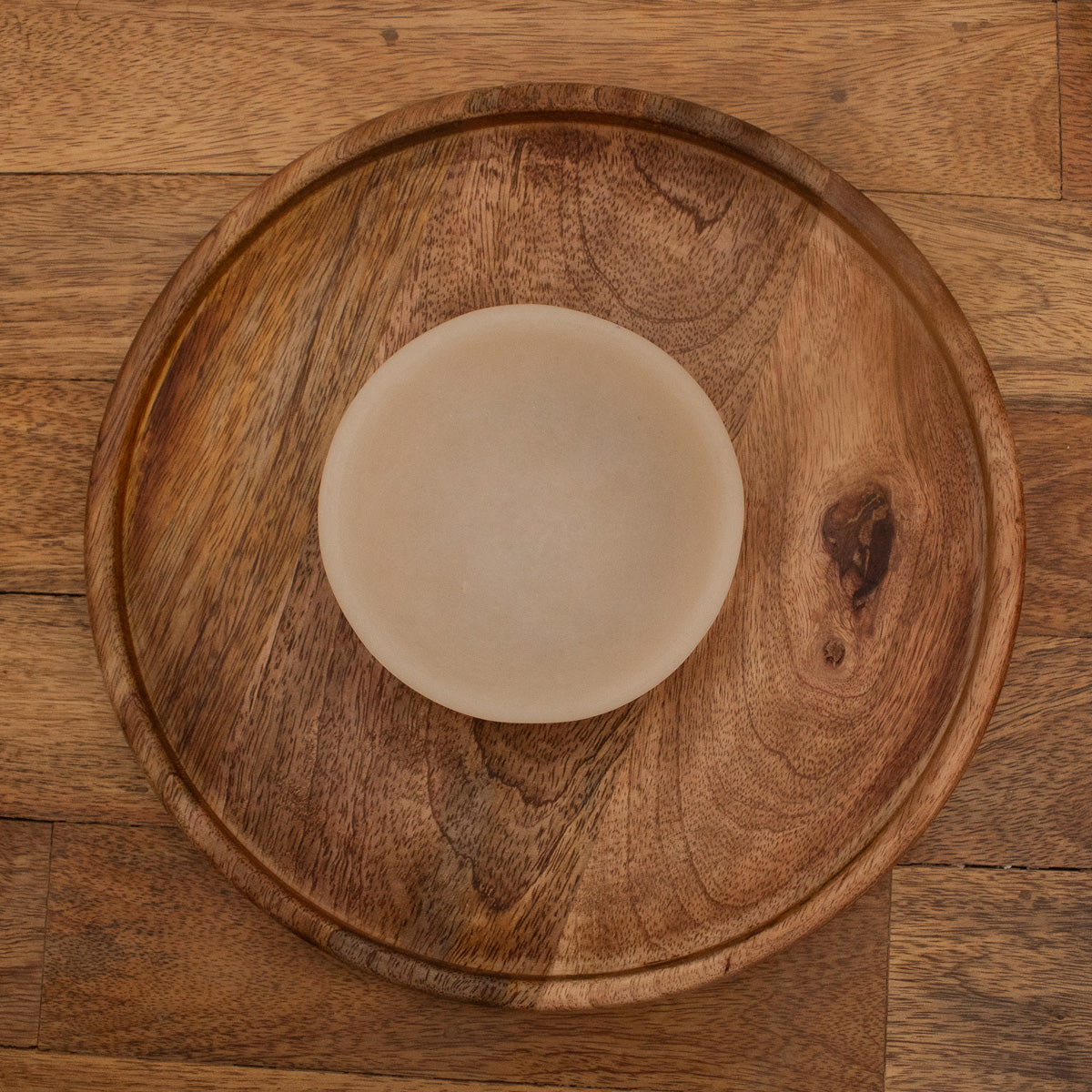 Top view of the wooden chip and dip platter and round bowl