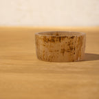 Close-up of the Basic horn napkin ring on a wooden surface