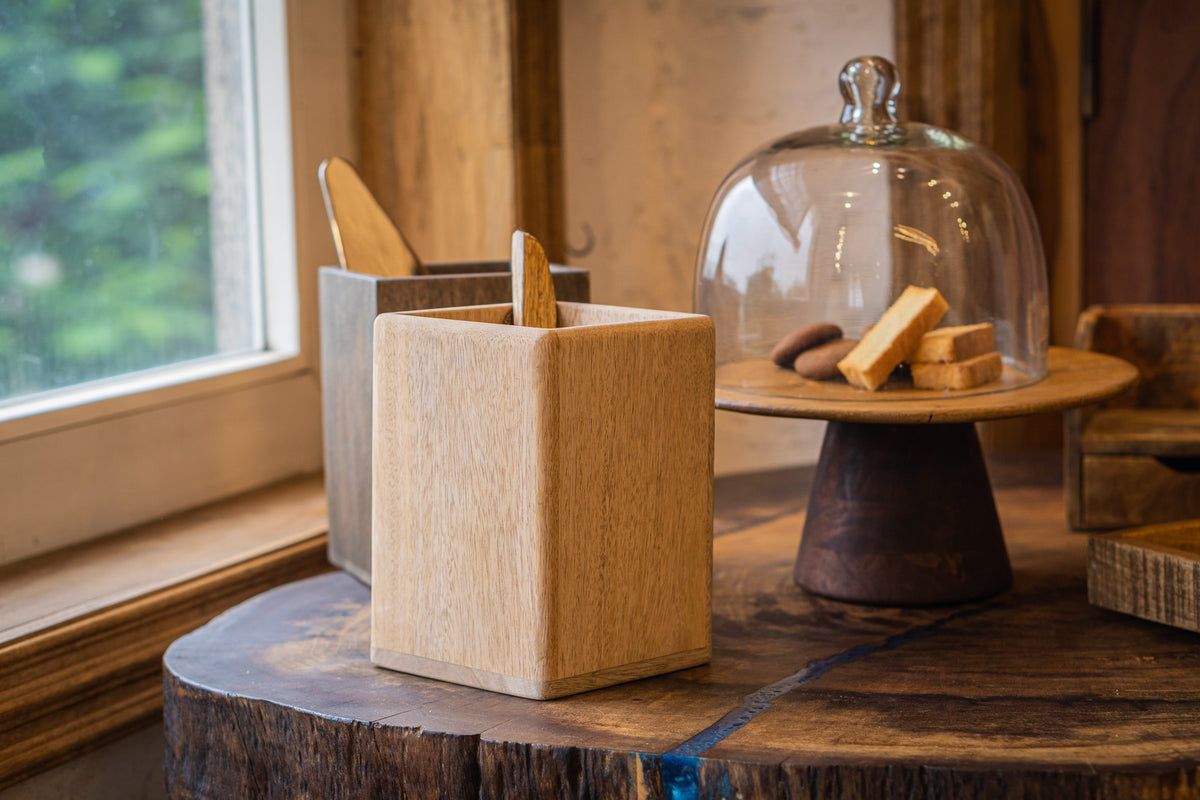 Two Glide wooden cutlery caddies styled with utensils