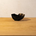 Front view of the empty fluted resin serving bowl