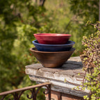 Large wooden bowl set stacked outdoors