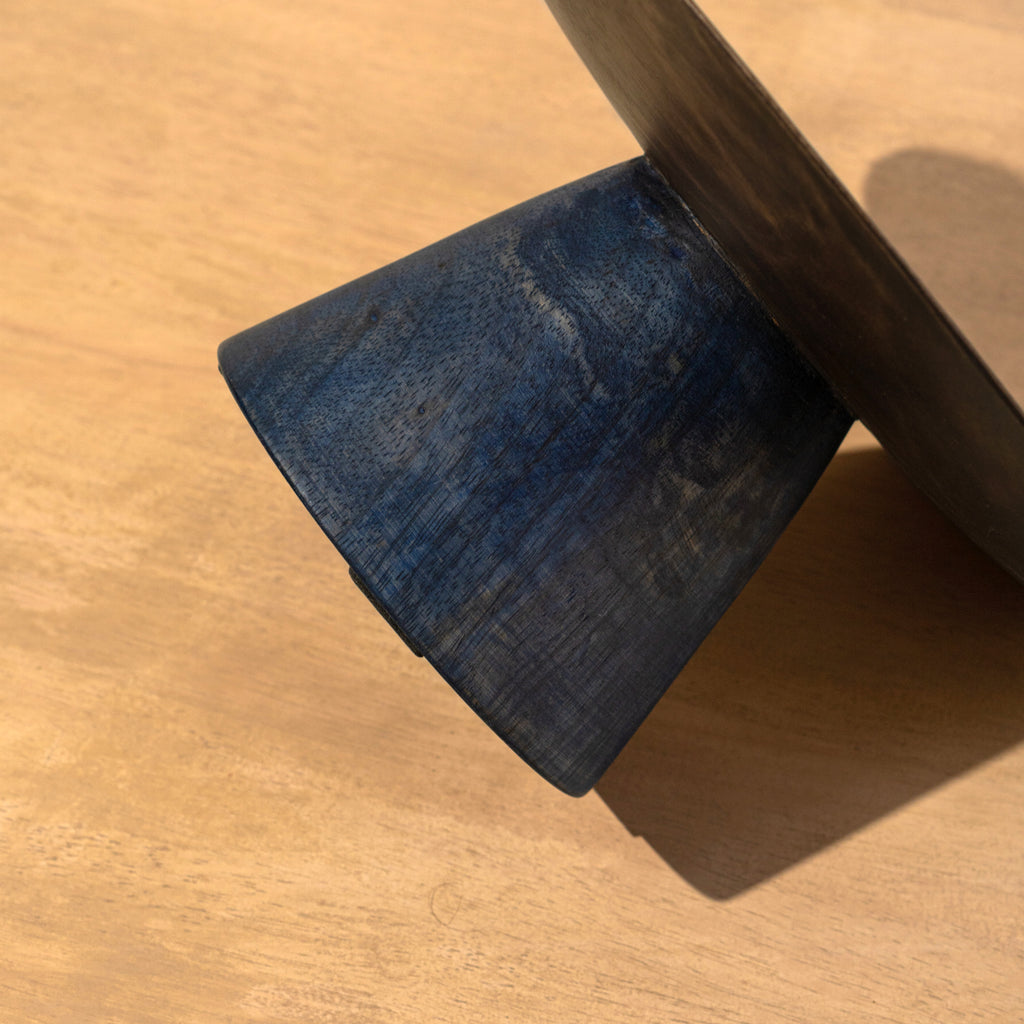 Close-up of the base of the Midnight wooden cake stand