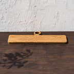 Front view of the oversized wooden cheese board