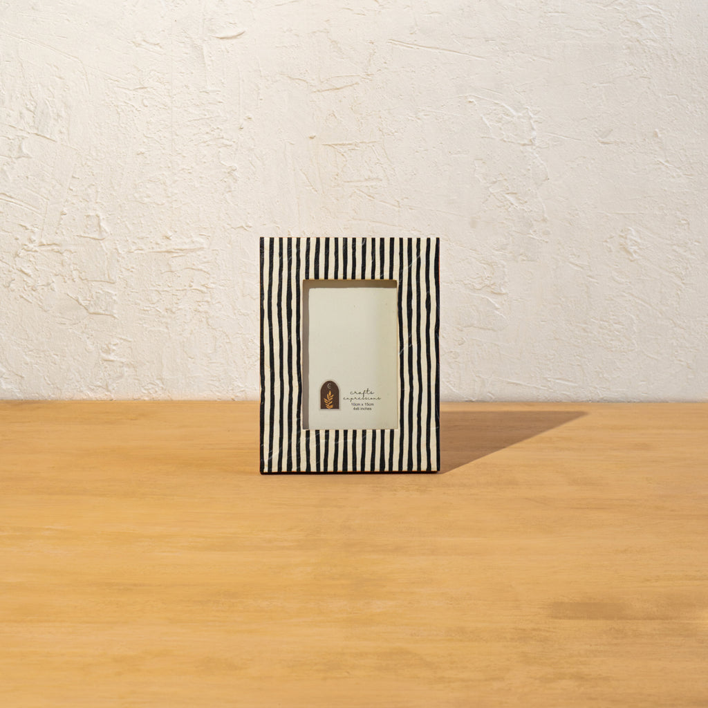 Front view of the striped wooden photo frame displayed vertically