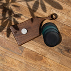 Twinkle wooden serving board and coasters displayed together